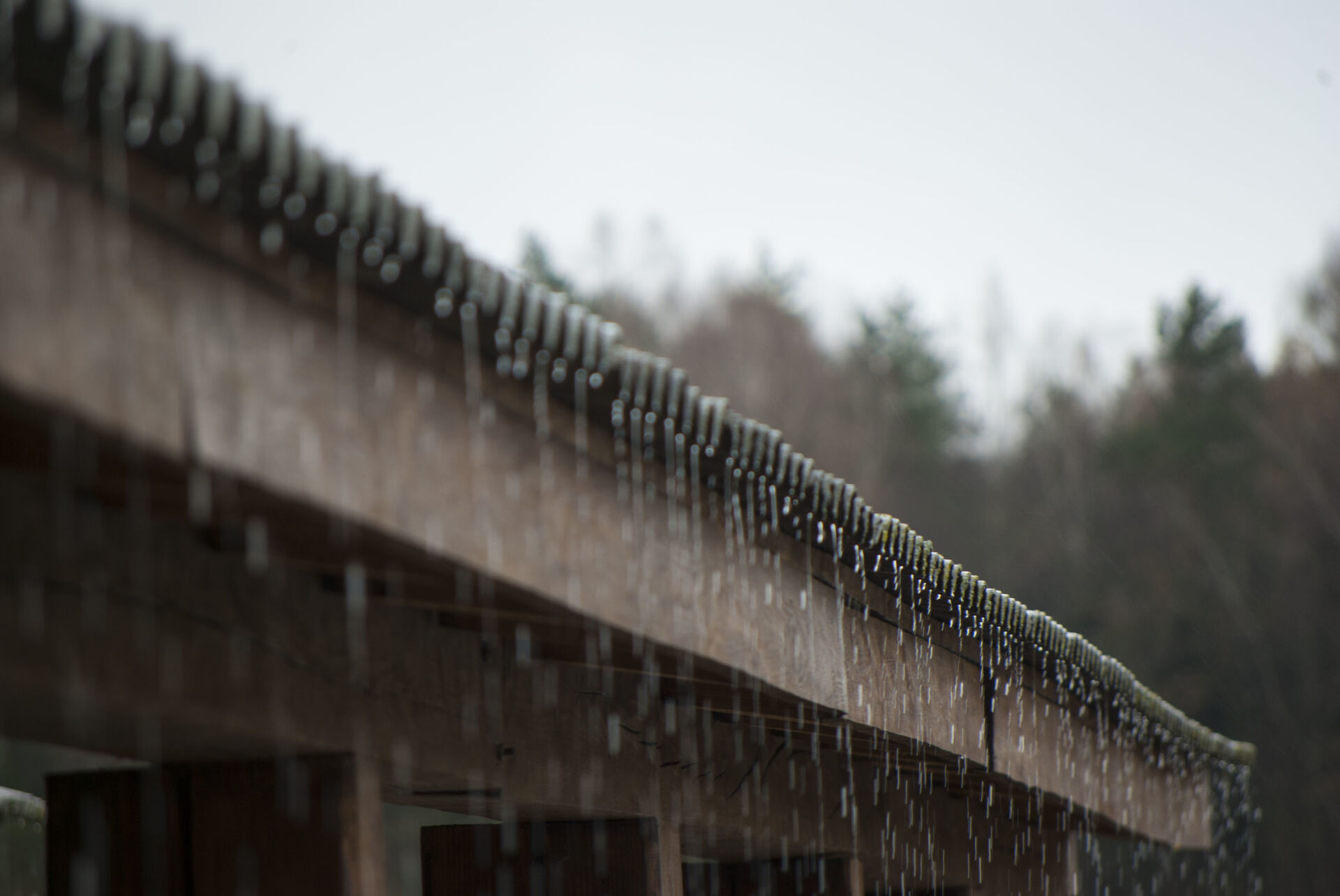 Rain running off roof after a roof repair job and now drains rain water correctly